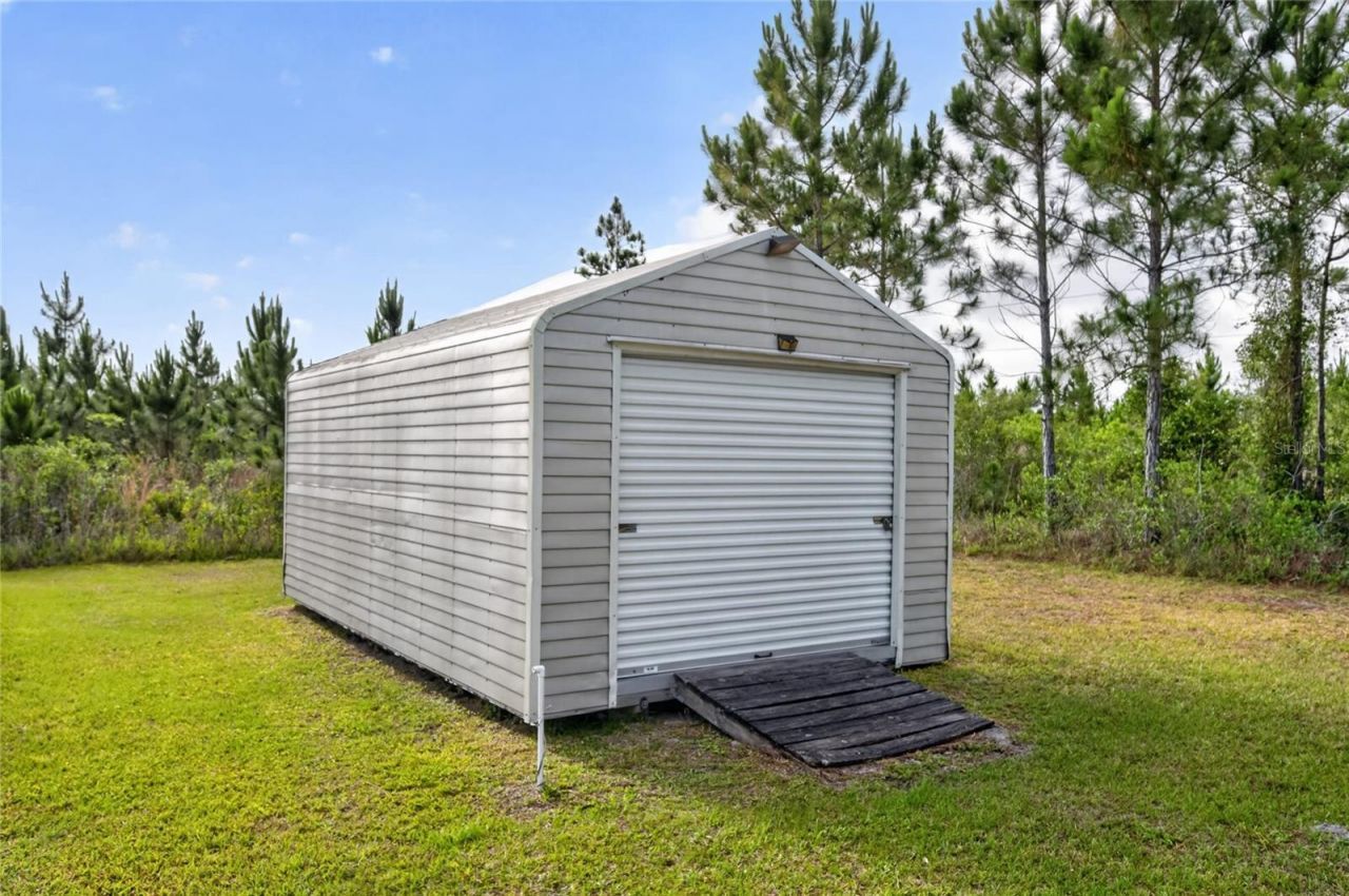 8433 Limonia Drive , Indian Lake Estates, FL 33855 Photo