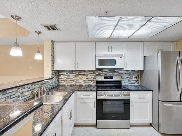 5011 Wiles Road, Unit 303, Coconut Creek, FL 33073