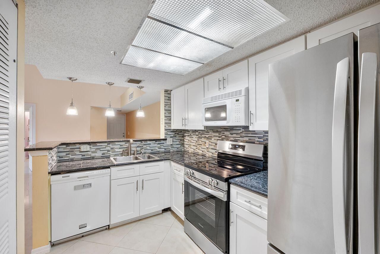 5011 Wiles Road, Unit 303, Coconut Creek, FL 33073 Photo