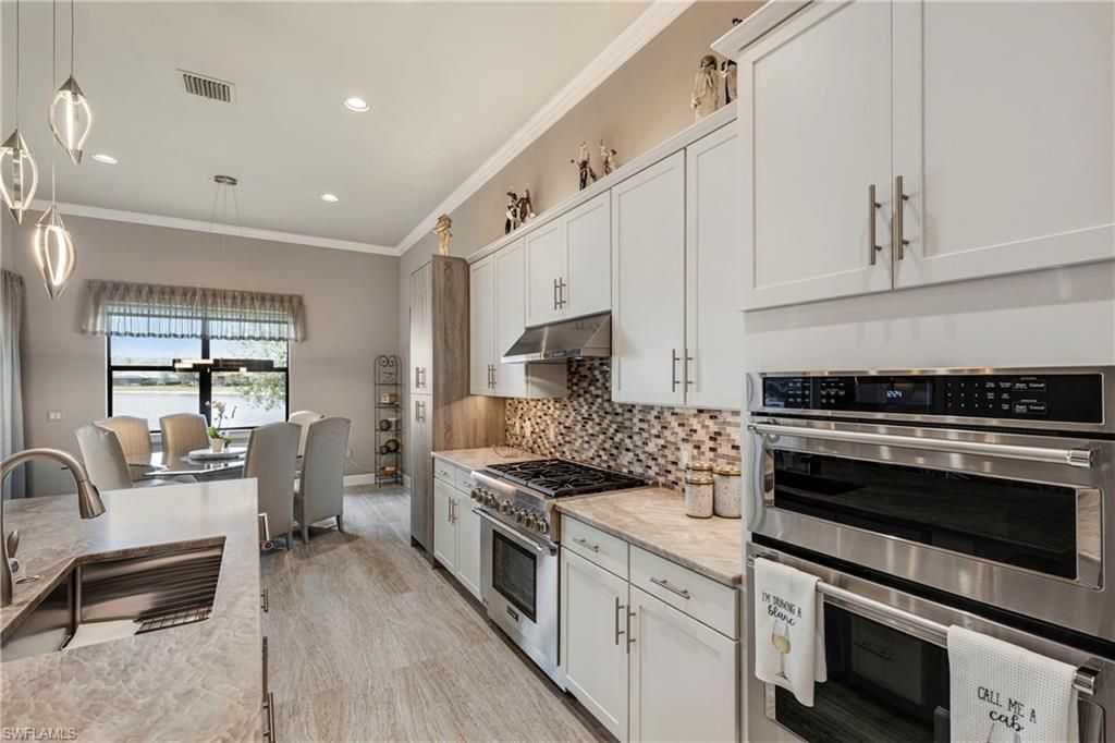 7478 Winding Cypress Dr, Naples, FL 34114 Photo