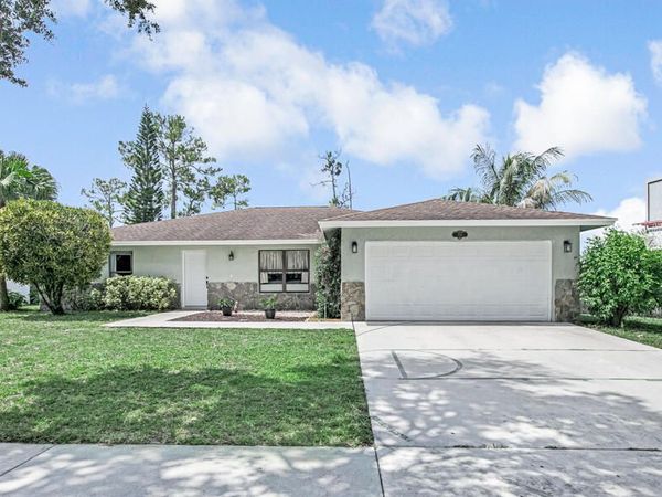 100 Greenwood Court, Royal Palm Beach, FL 33411
