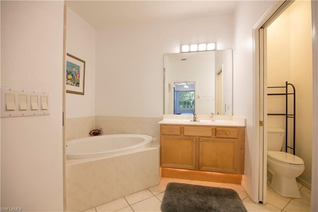 3964 Bishopwood Ct E, Unit 1-202, Naples, FL 34114 Photo