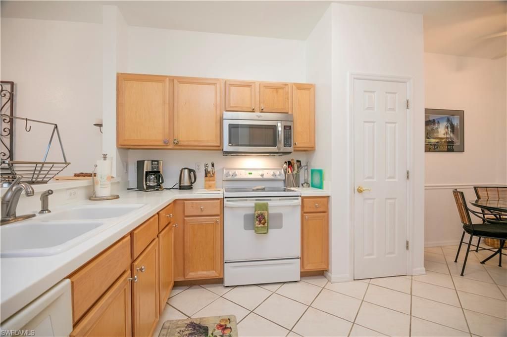 3964 Bishopwood Ct E, Unit 1-202, Naples, FL 34114 Photo