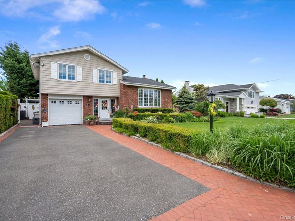 39 Brewster Road W, Massapequa, NY 11758
