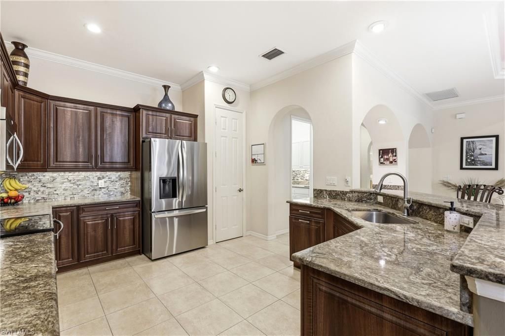 10736 Fieldfair Dr, Naples, FL 34119 Photo