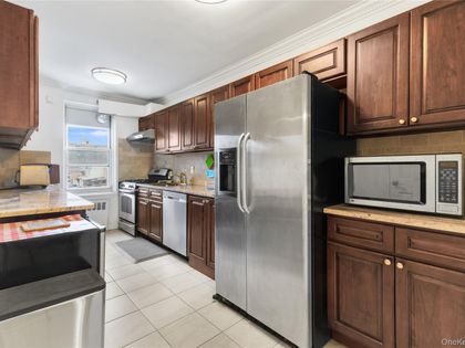 64-11 99th Street  Rego Park, NY 11374