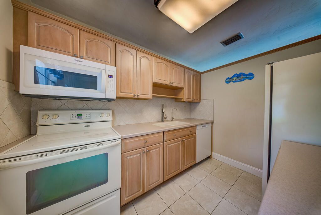 648 Eastwind Drive, North Palm Beach, FL 33408 Photo