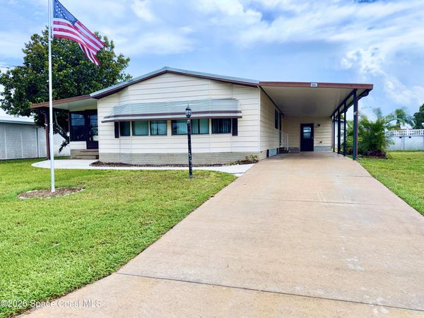 806 Draco Drive , Barefoot Bay, FL 32976