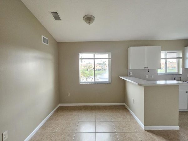 3490 Briar Bay Boulevard, Unit 206, West Palm Beach, FL 33411