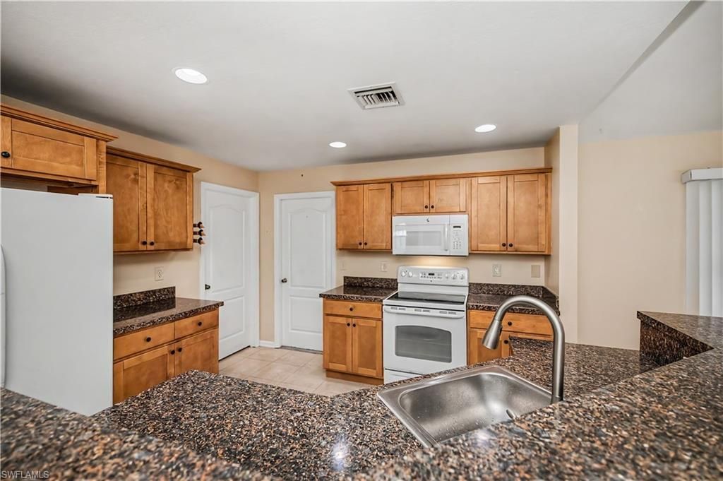 1922 Jacaranda Pkwy W, Cape Coral, FL 33993 Photo