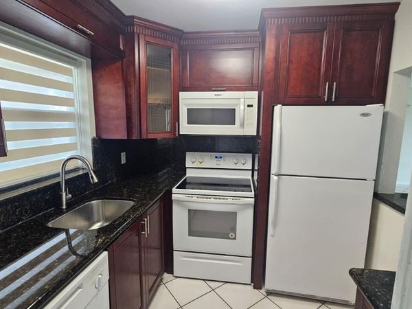 9911 Sandalfoot Boulevard, Unit 116, Boca Raton, FL 33428