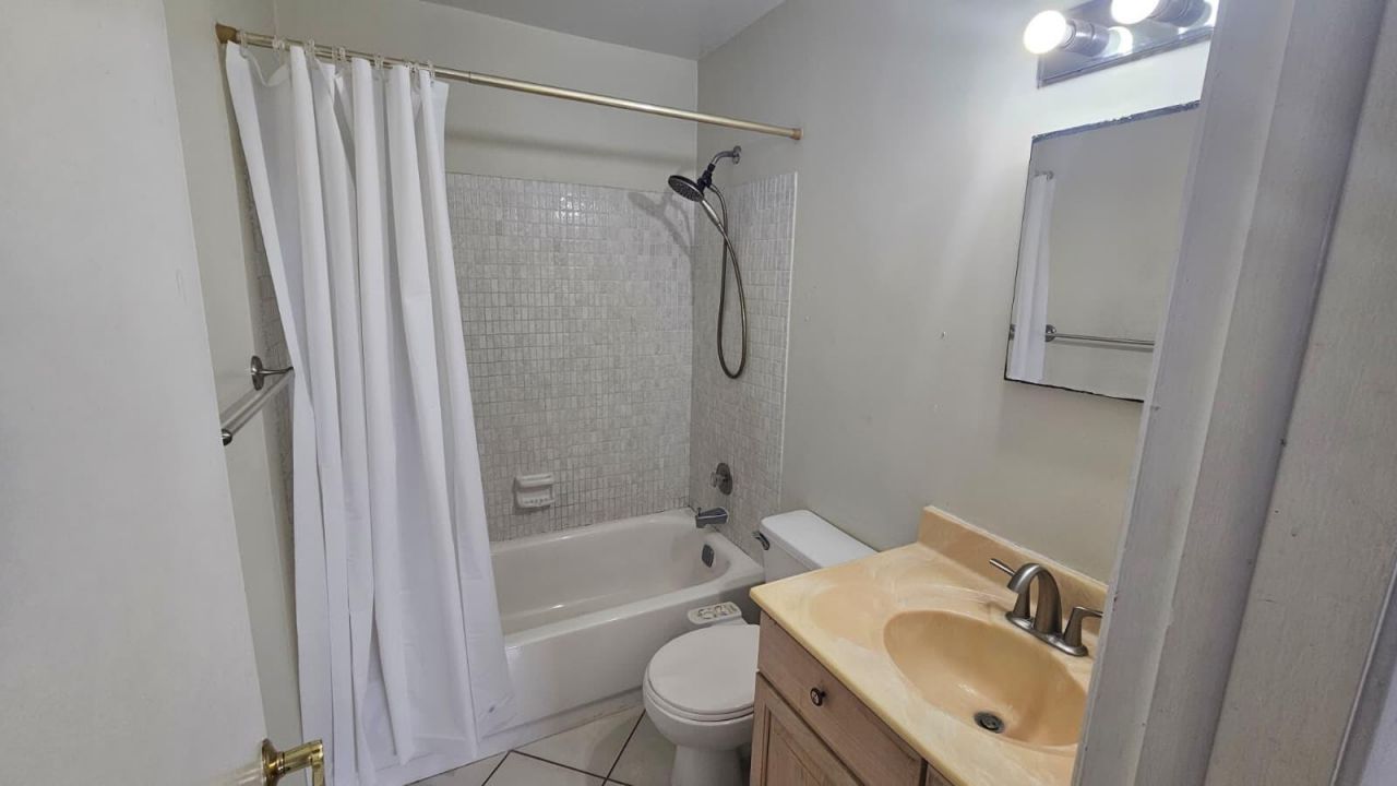 9911 Sandalfoot Boulevard, Unit 116, Boca Raton, FL 33428 Photo