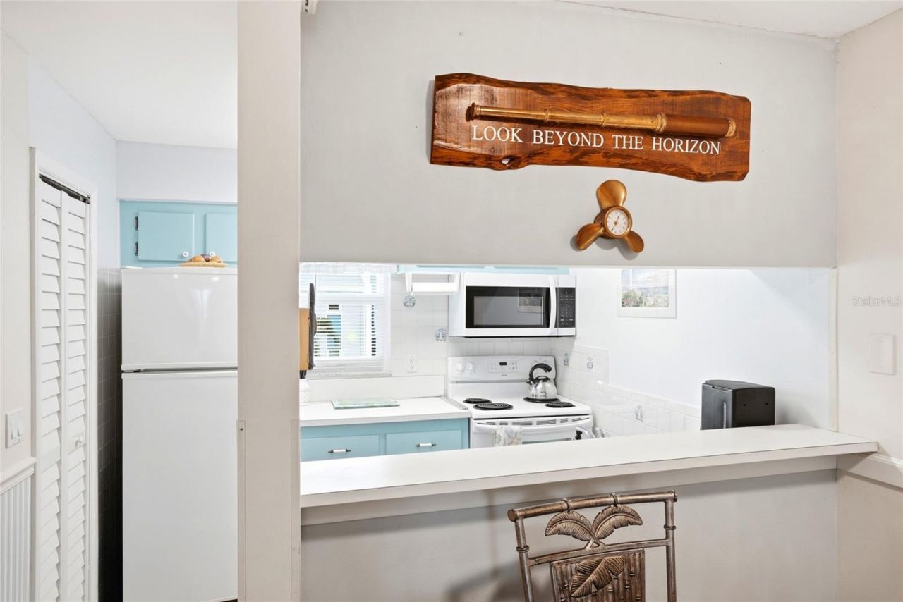 320 Medallion Boulevard , Unit H, Madeira Beach, FL 33708 Photo