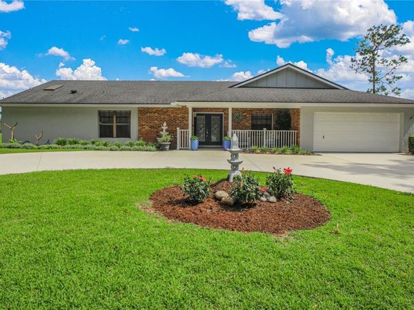 7243 WOODVILLE CRESCENT, ORLANDO, FL 32819
