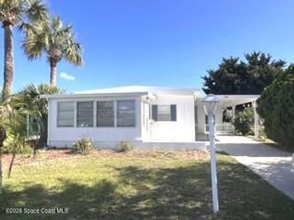 886 Pecan Circle, Barefoot Bay, FL 32976