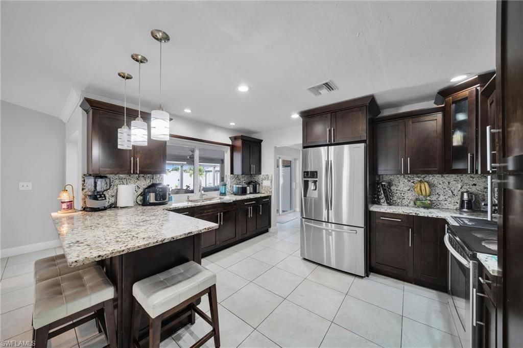 3221 SW 11th Pl , Cape Coral, FL 33914 Photo