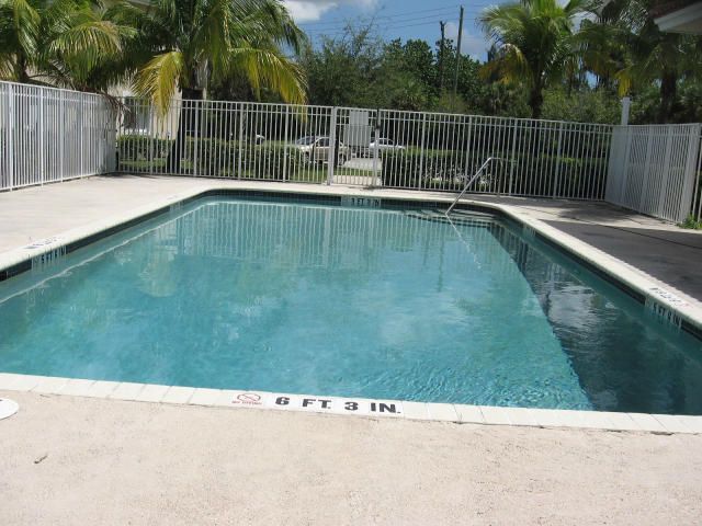 1049 Golden Lakes Boulevard, Unit 122, West Palm Beach, FL 33411 Photo