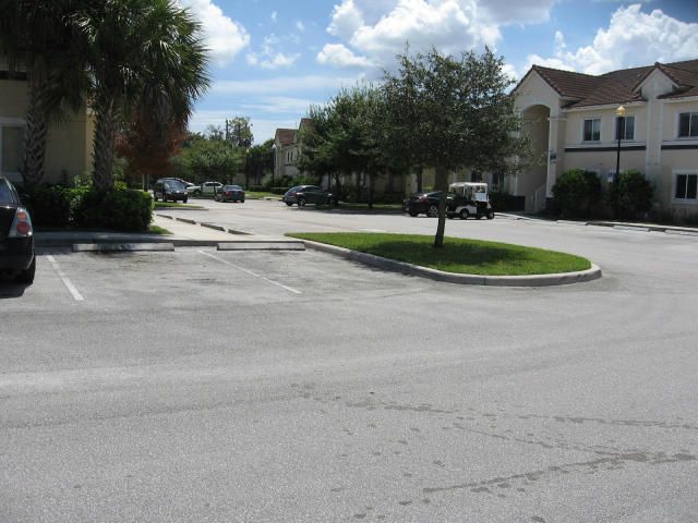 1049 Golden Lakes Boulevard, Unit 122, West Palm Beach, FL 33411 Photo