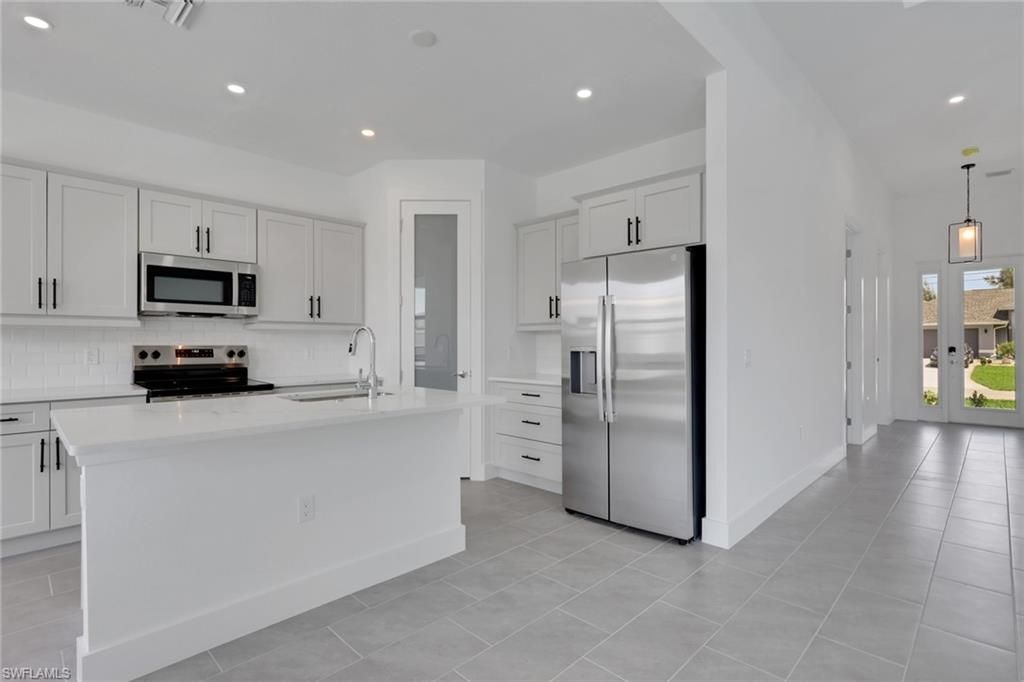 1408 NW 2nd St , Cape Coral, FL 33993 Photo
