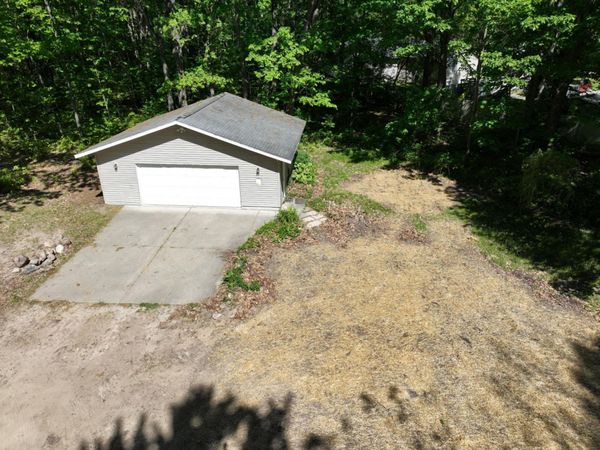 302 Bay City Trail, Houghton Lake, MI 48629