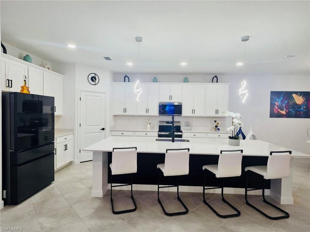 9230 Aqua Overlook Ct , Lehigh Acres, FL 33936 Photo
