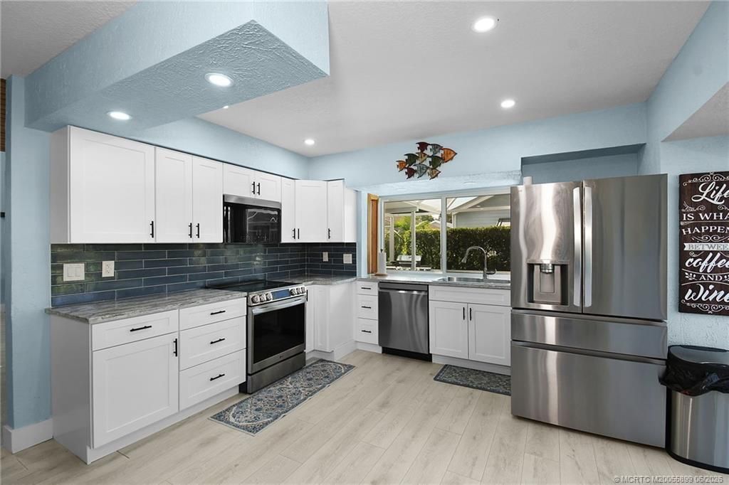 4061 NE Breakwater Drive, Jensen Beach, FL 34957 Photo
