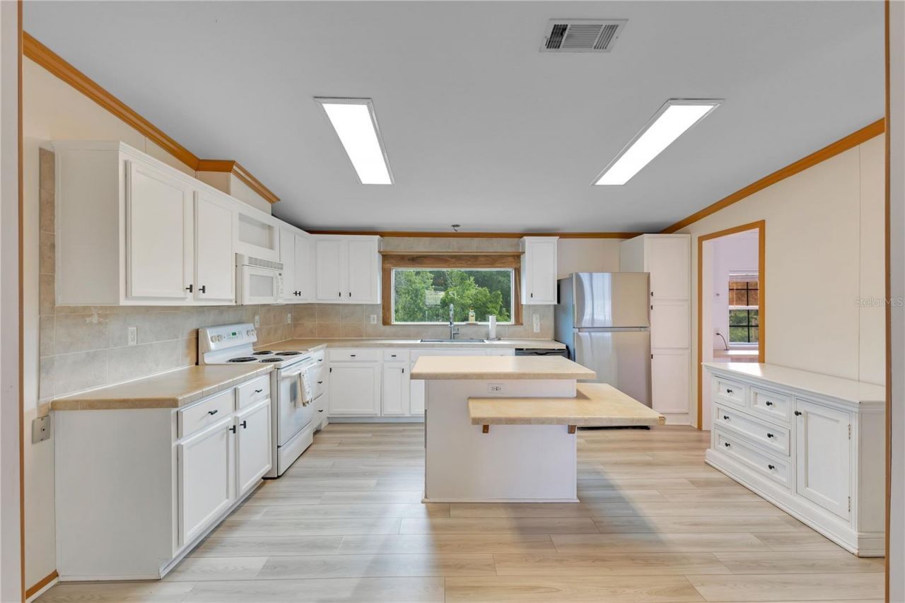 410 Lagoon Court, Kenansville, FL 34739 Photo