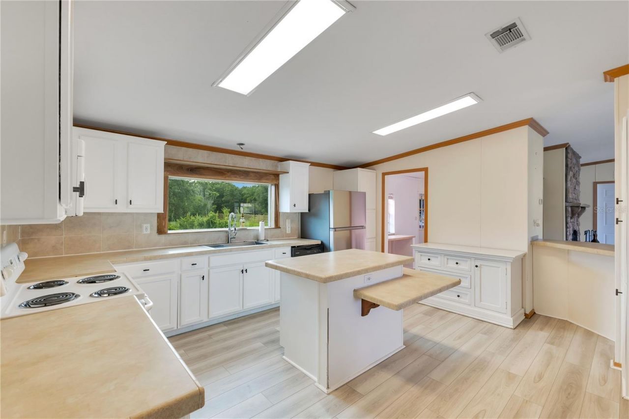 410 Lagoon Court, Kenansville, FL 34739 Photo