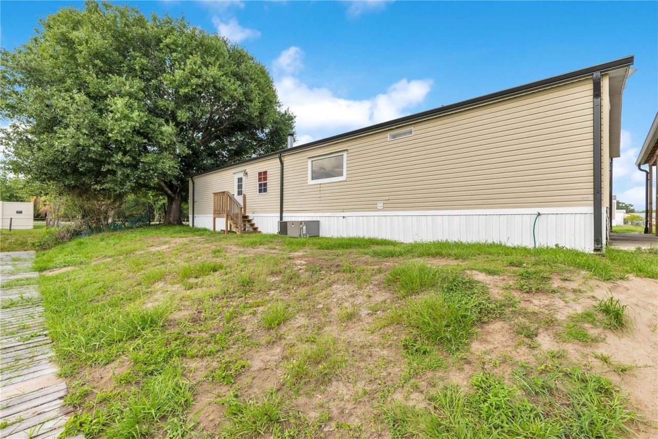 410 Lagoon Court, Kenansville, FL 34739 Photo