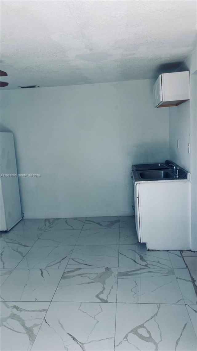 1120 NW 147th St , Miami, FL 33168 Photo