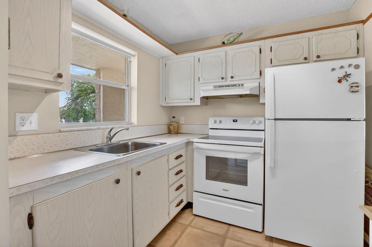 9855 Sandalfoot Boulevard , Unit Apt 317, Boca Raton, FL 33428 Photo