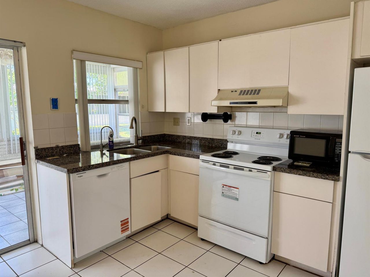 7105 NW 70th Court , Tamarac, FL 33321 Photo
