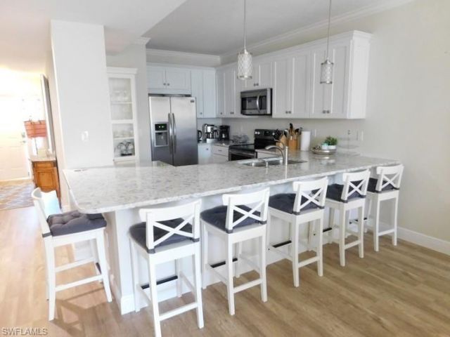 7655 Pebble Creek Cir, Unit 302, Naples, FL 34108 Photo