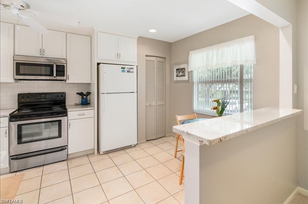 5739 Whitaker Rd, Unit A202, Naples, FL 34112 Photo