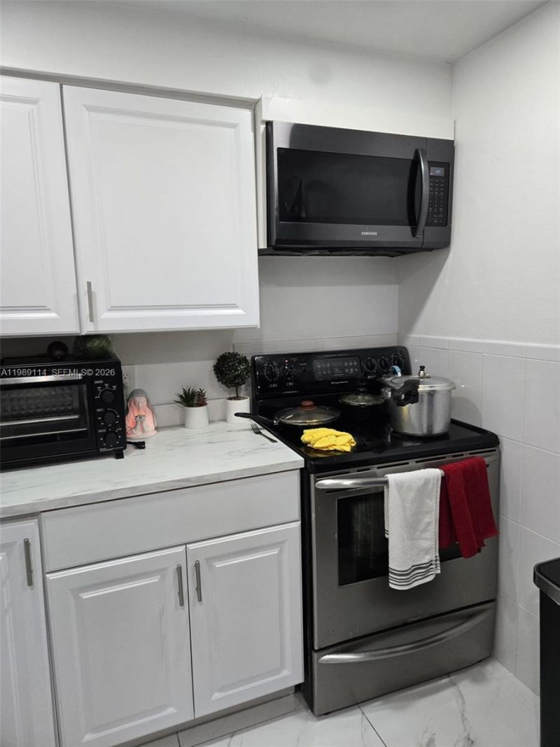 6195 Rock Island Rd , Unit 409, Tamarac, FL 33319 Photo