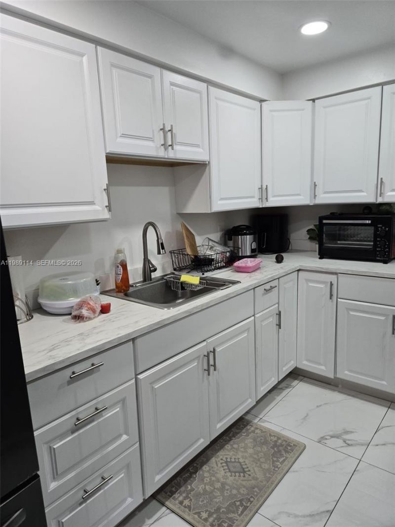 6195 Rock Island Rd , Unit 409, Tamarac, FL 33319 Photo