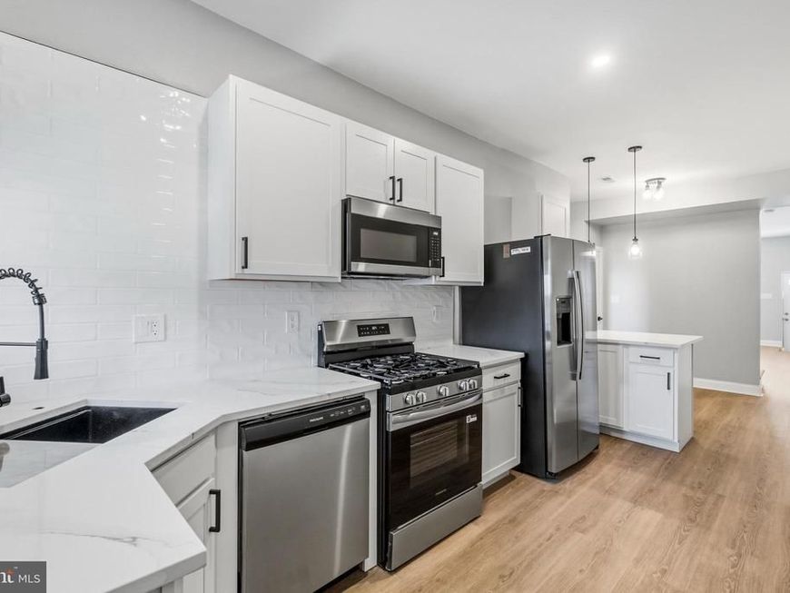 1410 E Lanvale Street , Baltimore, MD 21213 Main Photo