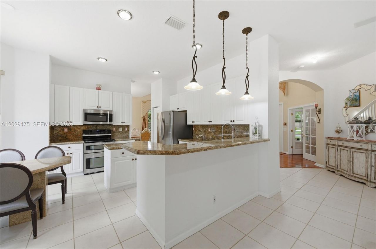 4909 NW 115th Way , Coral Springs, FL 33076 Photo