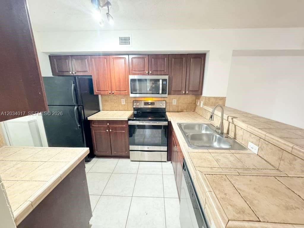 1715 Village Blvd, Unit 107, West Palm Beach, FL 33409 Photo