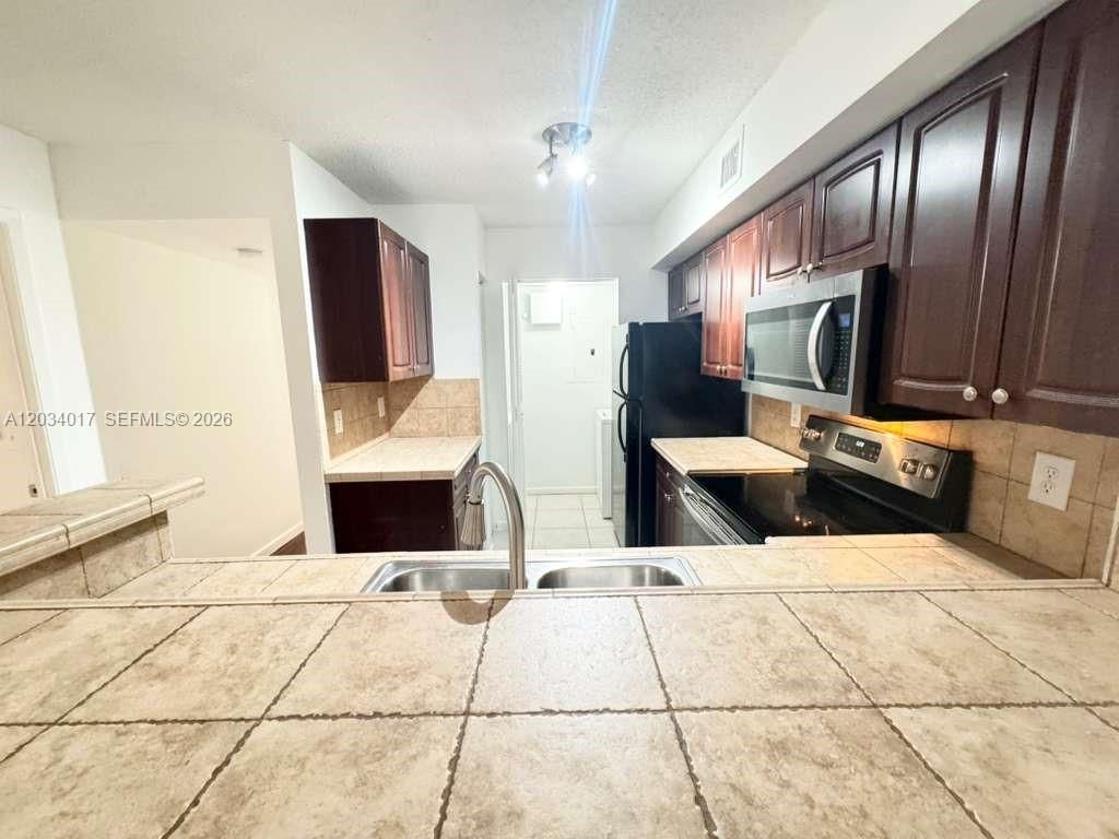 1715 Village Blvd, Unit 107, West Palm Beach, FL 33409 Photo