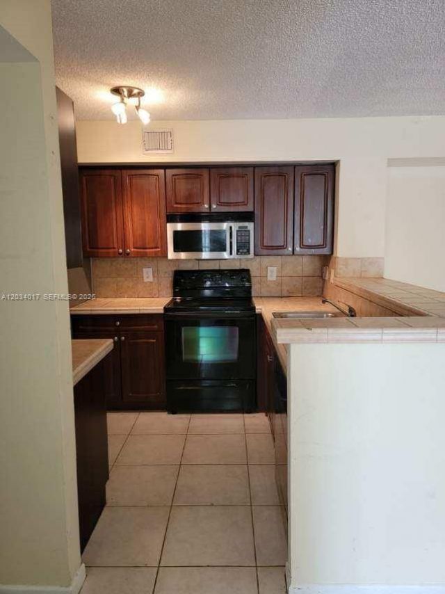 1715 Village Blvd , Unit 107, West Palm Beach, FL 33409 Photo