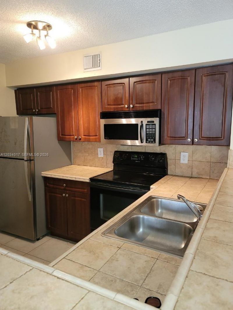 1715 Village Blvd , Unit 107, West Palm Beach, FL 33409 Photo