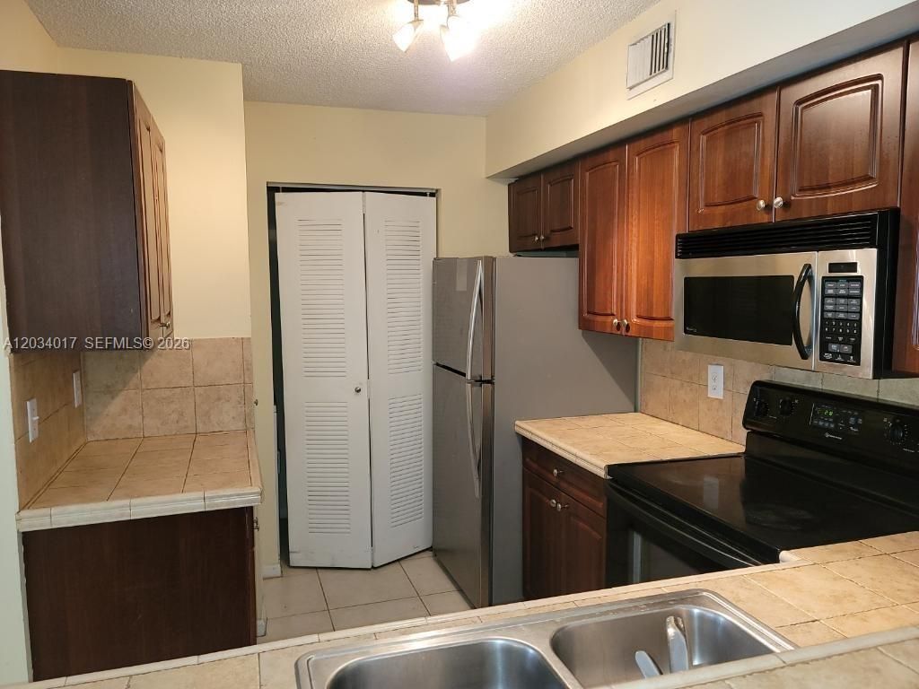1715 Village Blvd , Unit 107, West Palm Beach, FL 33409 Photo