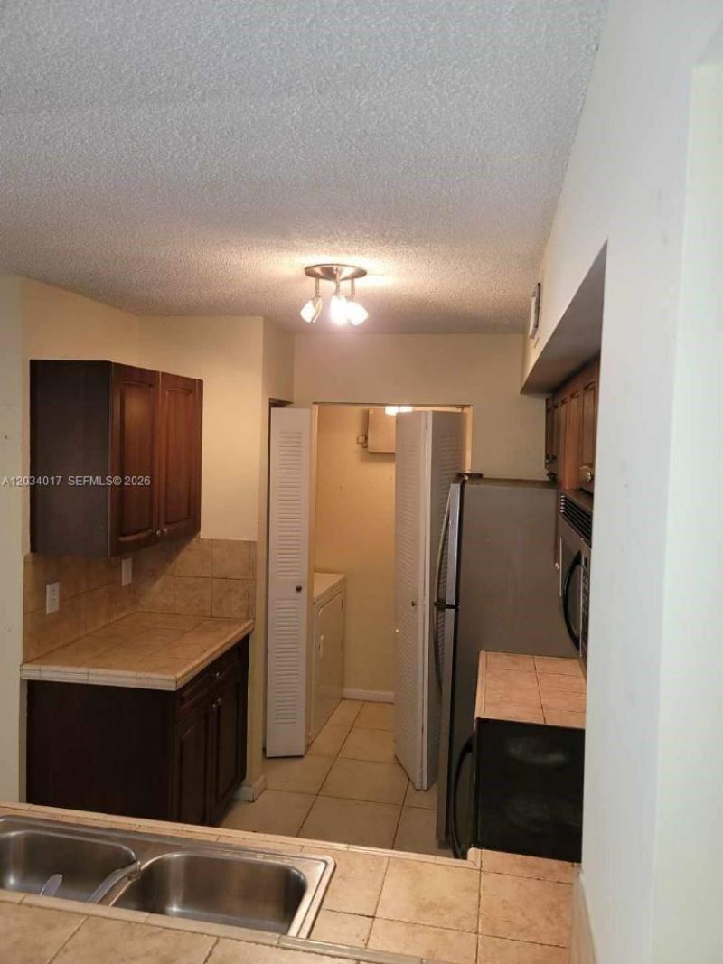 1715 Village Blvd , Unit 107, West Palm Beach, FL 33409 Photo