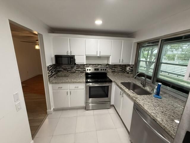 9081 Lime Bay Boulevard, Unit 211, Tamarac, FL 33321 Photo
