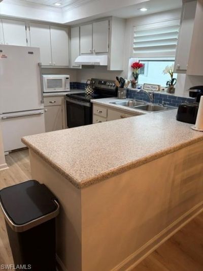 5 High Point Cir W, Unit 206, Naples, FL 34103 Photo