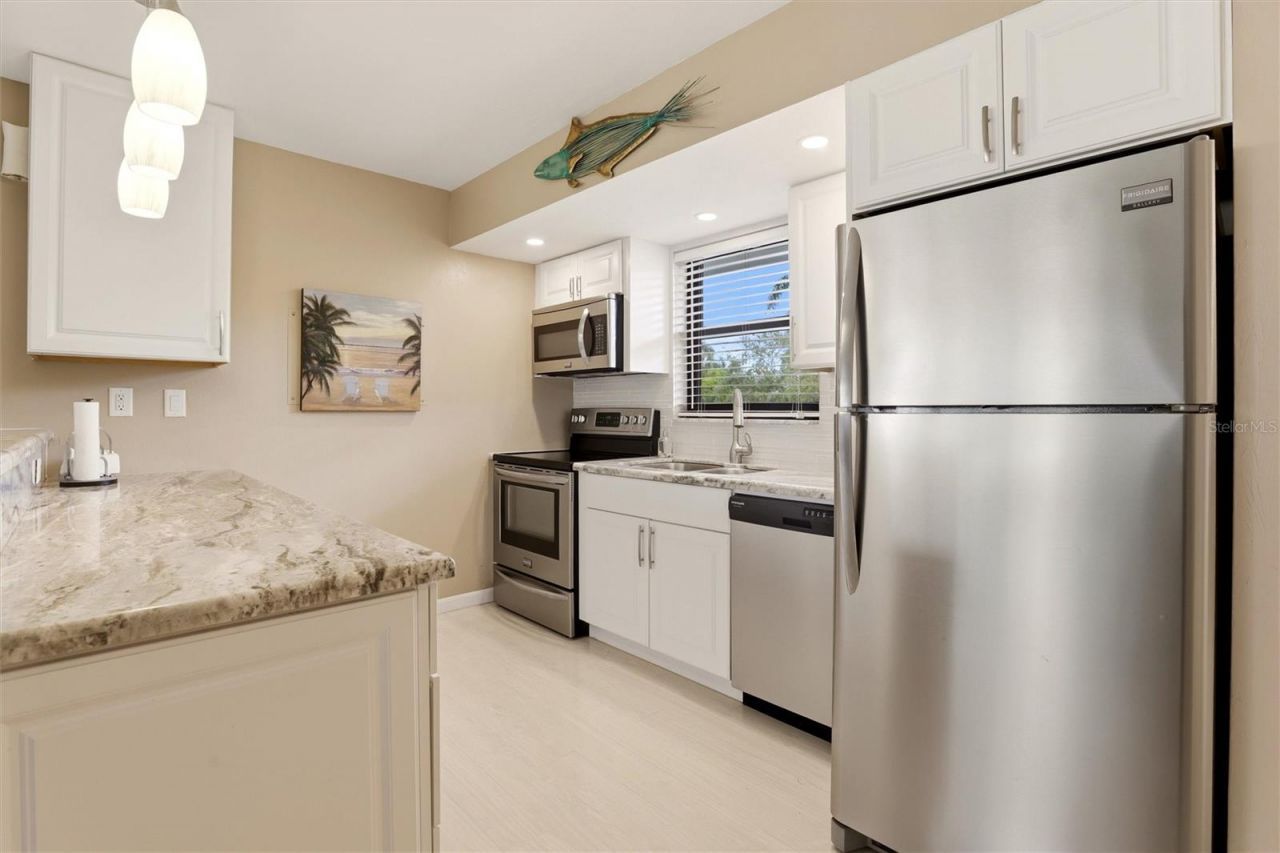 1011 Anglers Cove, Unit H203, Marco Island, FL 34145 Photo