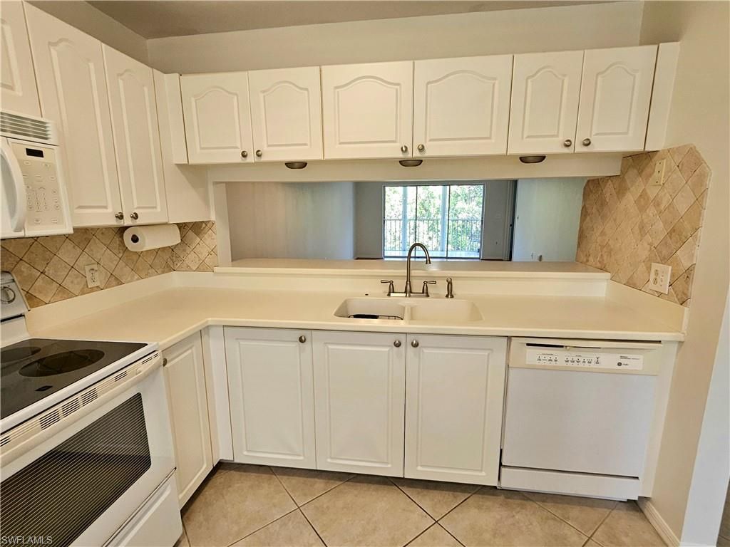 3001 Sandpiper Bay Cir , Unit B202, Naples, FL 34112 Photo