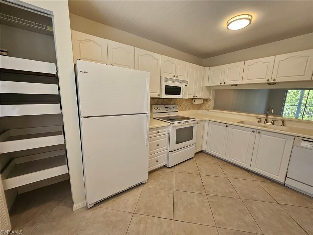 3001 Sandpiper Bay Cir , Unit B202, Naples, FL 34112 Photo
