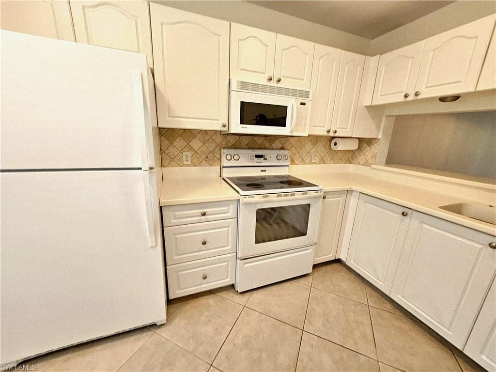 3001 Sandpiper Bay Cir , Unit B202, Naples, FL 34112 Photo